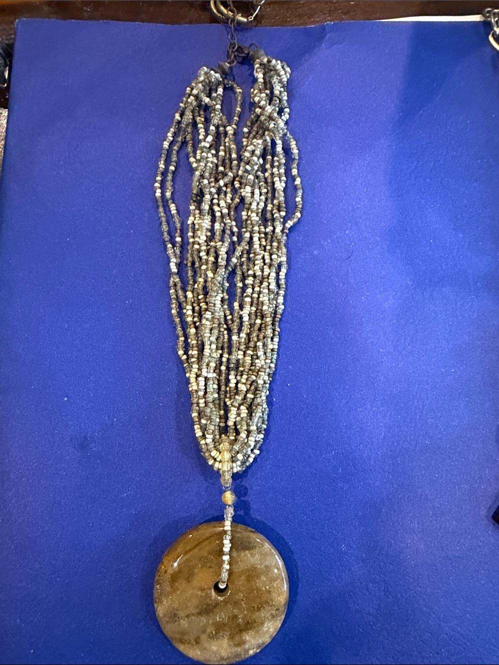 Beaded Multi-Strand Necklace with Brown Stone Pendant
